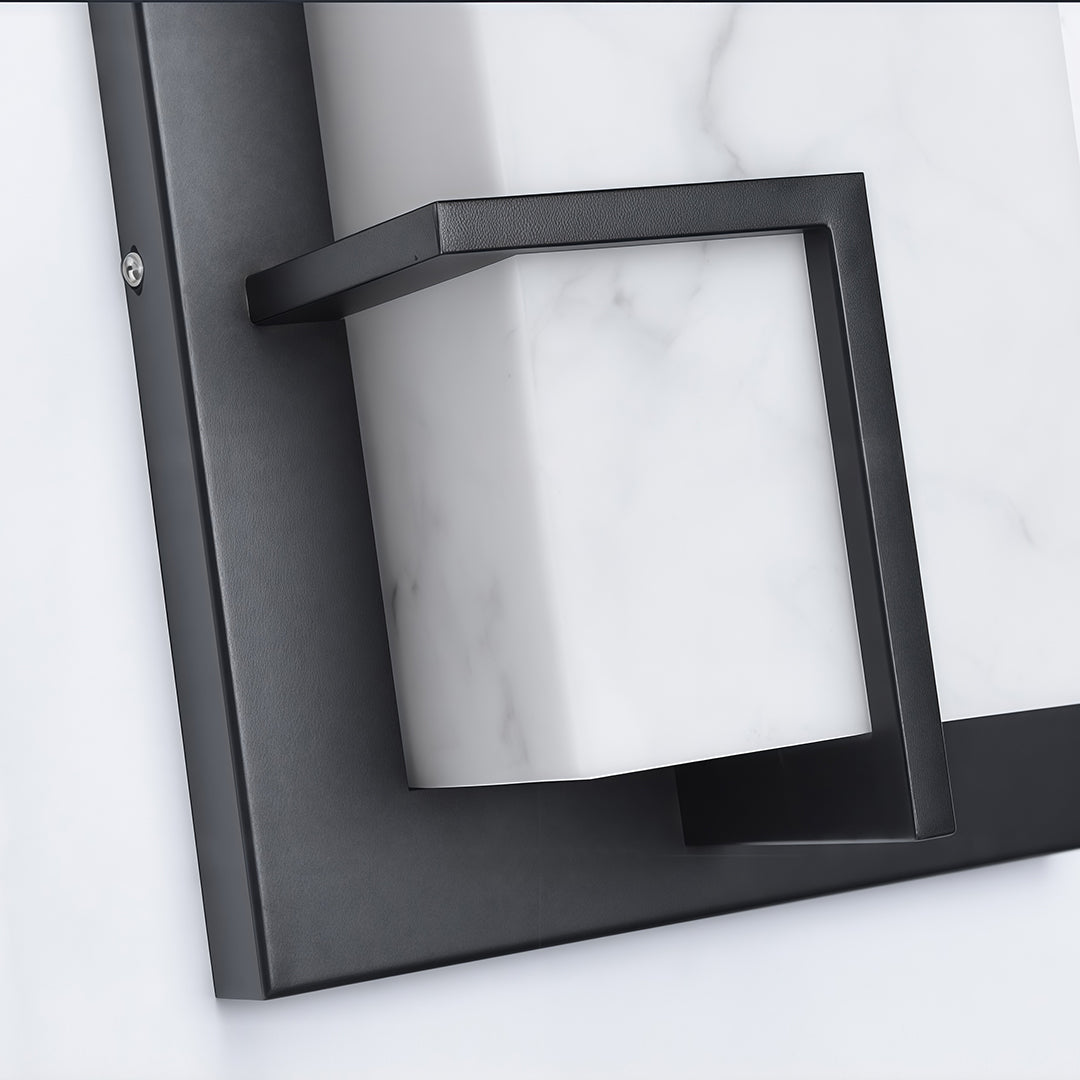 Top view of exterior wall lights black featuring glass shade chandelier design showing textured black frame detail.