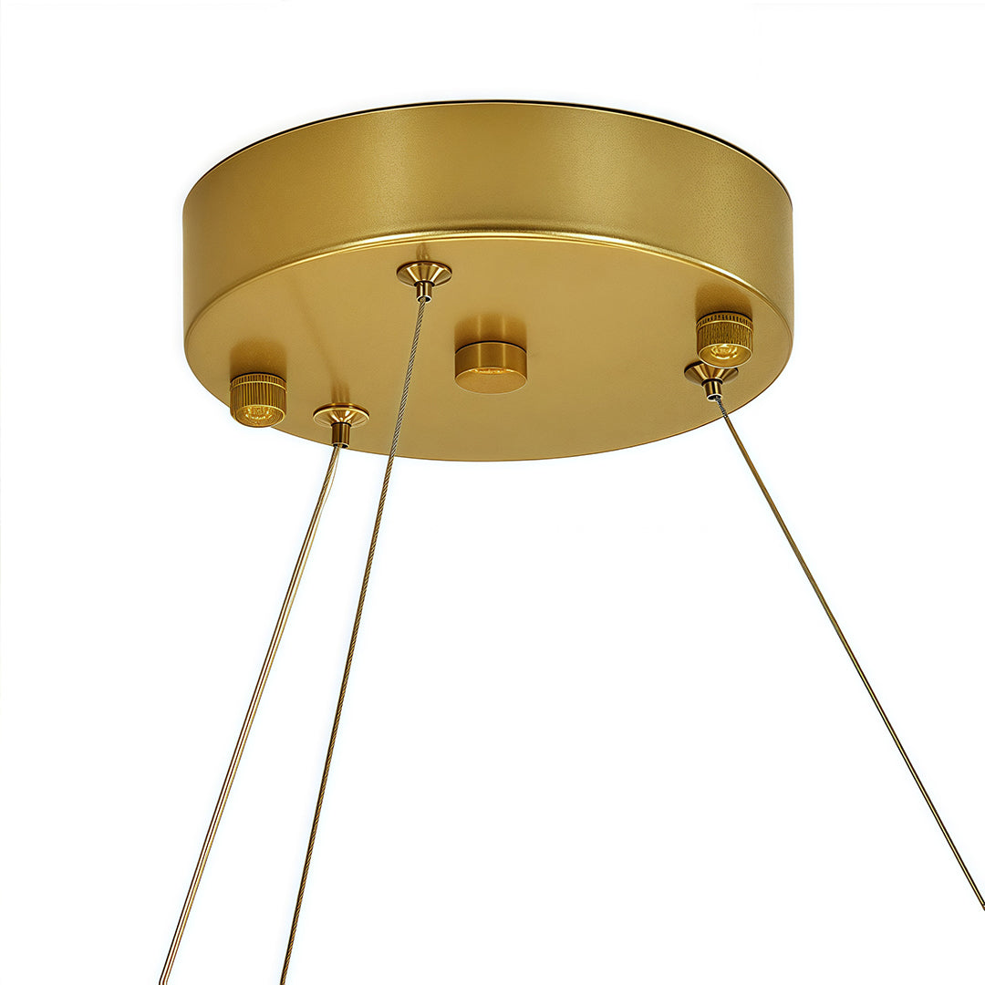 Top view of large glass chandelier, detailed perspective of gold frame and crystal design