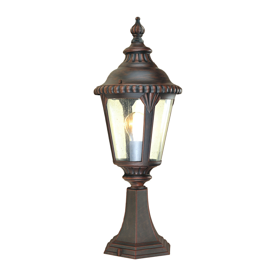 Traditional fence pillar light featuring decorative metalwork and frosted glass on white background
