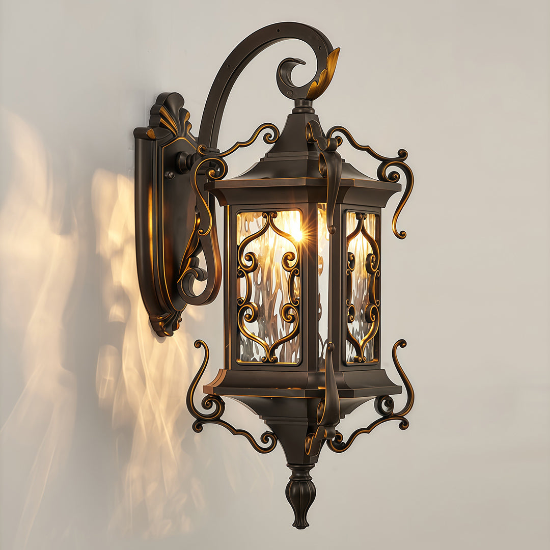 Traditional Outdoor Wall Sconce Light with ornate metal frame and warm lighting effect.