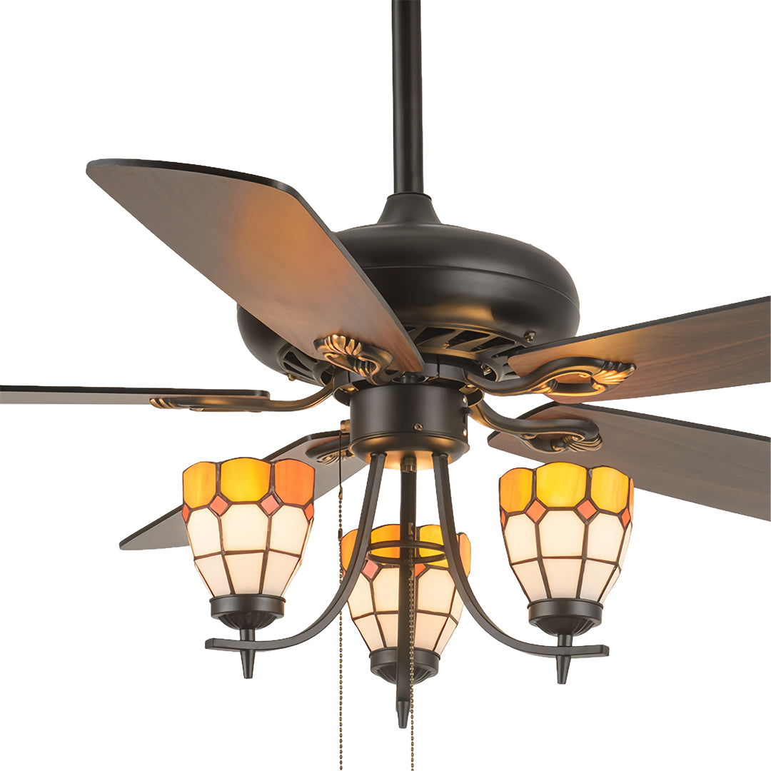 Traditional vintage style ceiling fan with lights featuring five wood-grain blades and three lantern-style glass light covers.