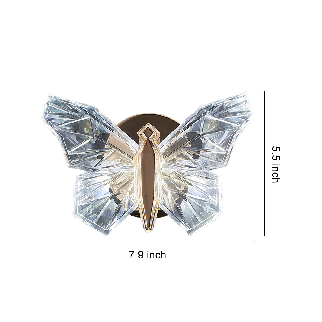 Elegant butterfly wall light with translucent blue-gray wings and bronze body mounted on white background