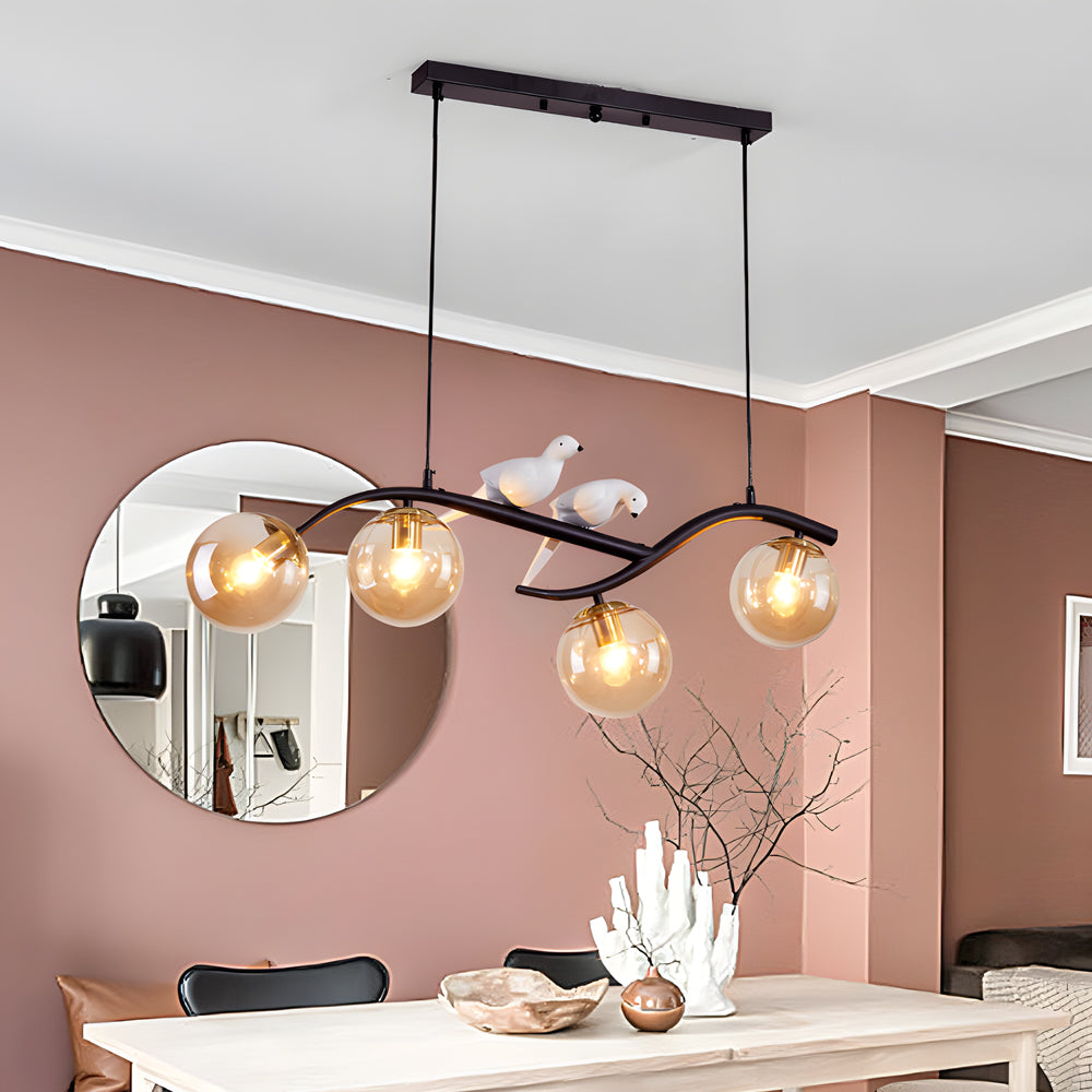 Tree branch pendant light with warm bulbs in contemporary interior.