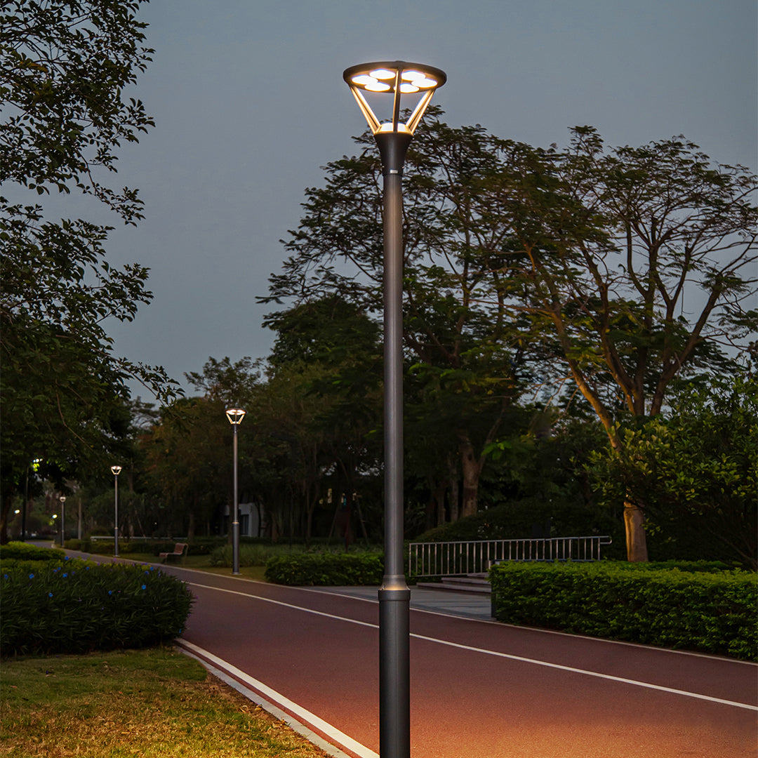 Tree-lined boulevard with ornamental street lighting creating elegant urban landscape design