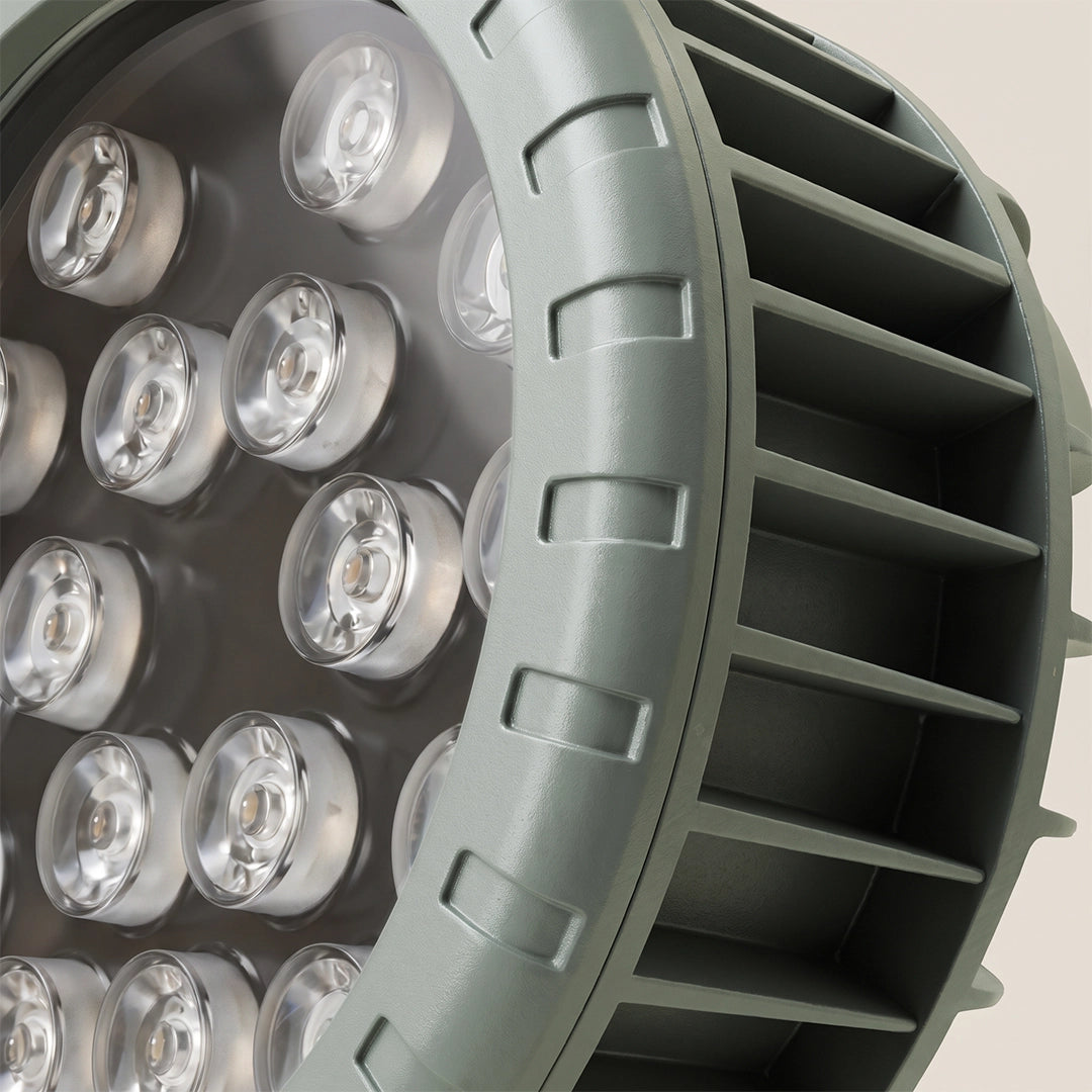 Close-up of the tree spotlight head showing multiple LED lenses and a finned black housing.