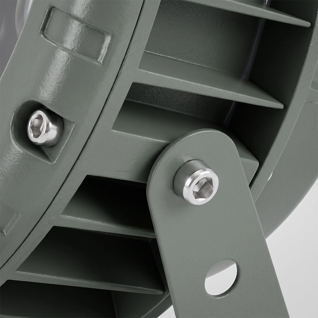 Close-up of the tree spotlight mounting bracket and black finned housing detail.