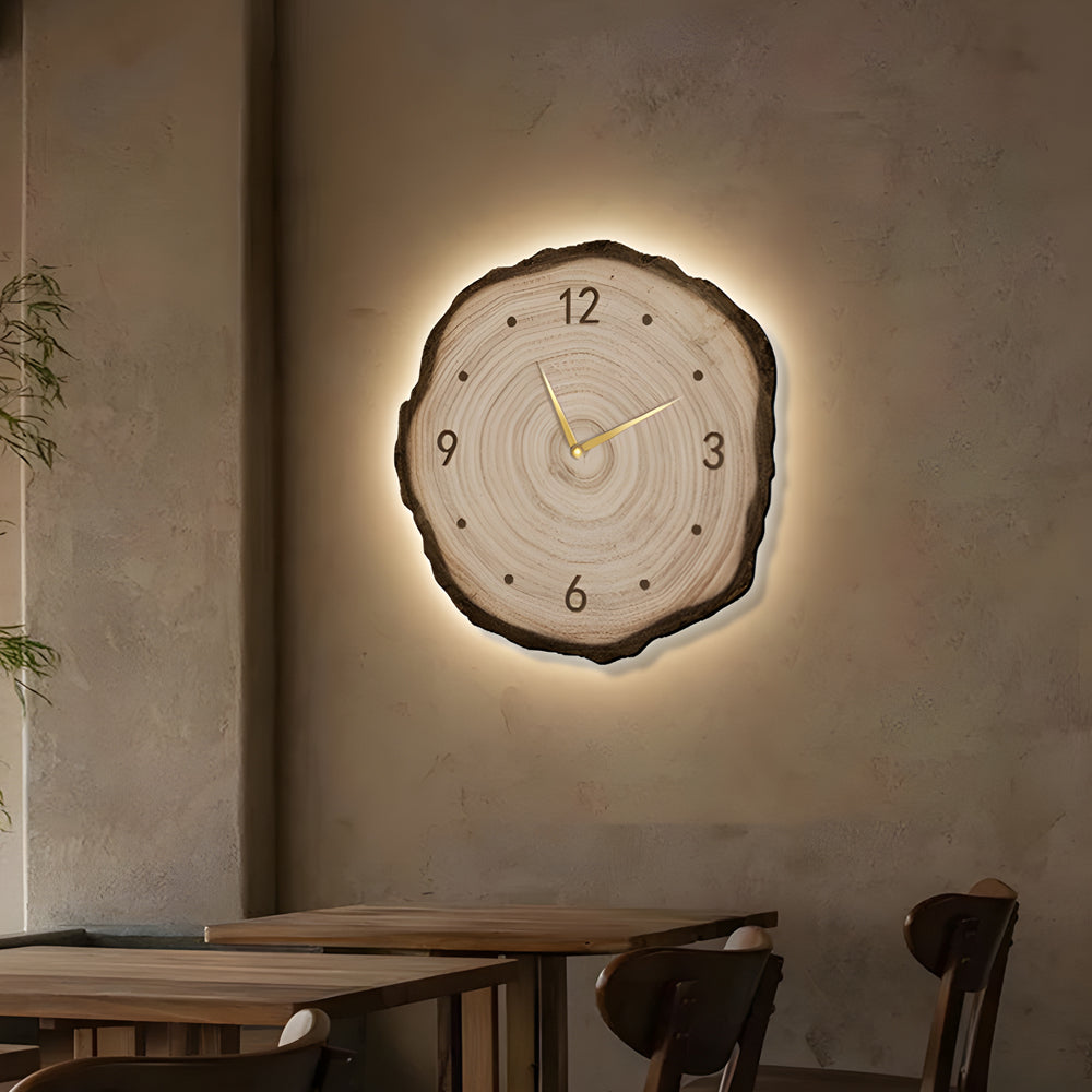 Warm-toned tree stump wall clock with glowing LED edges, designed to bring a touch of nature into your home decor.