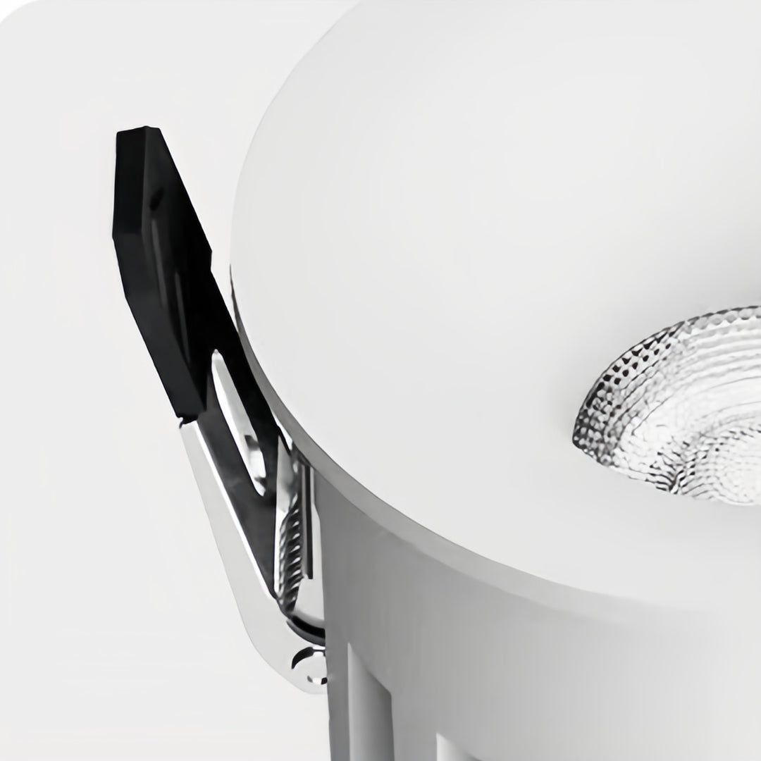 Trimless recessed downlights with decorative crystal trim detail installed in elegant ceiling setting