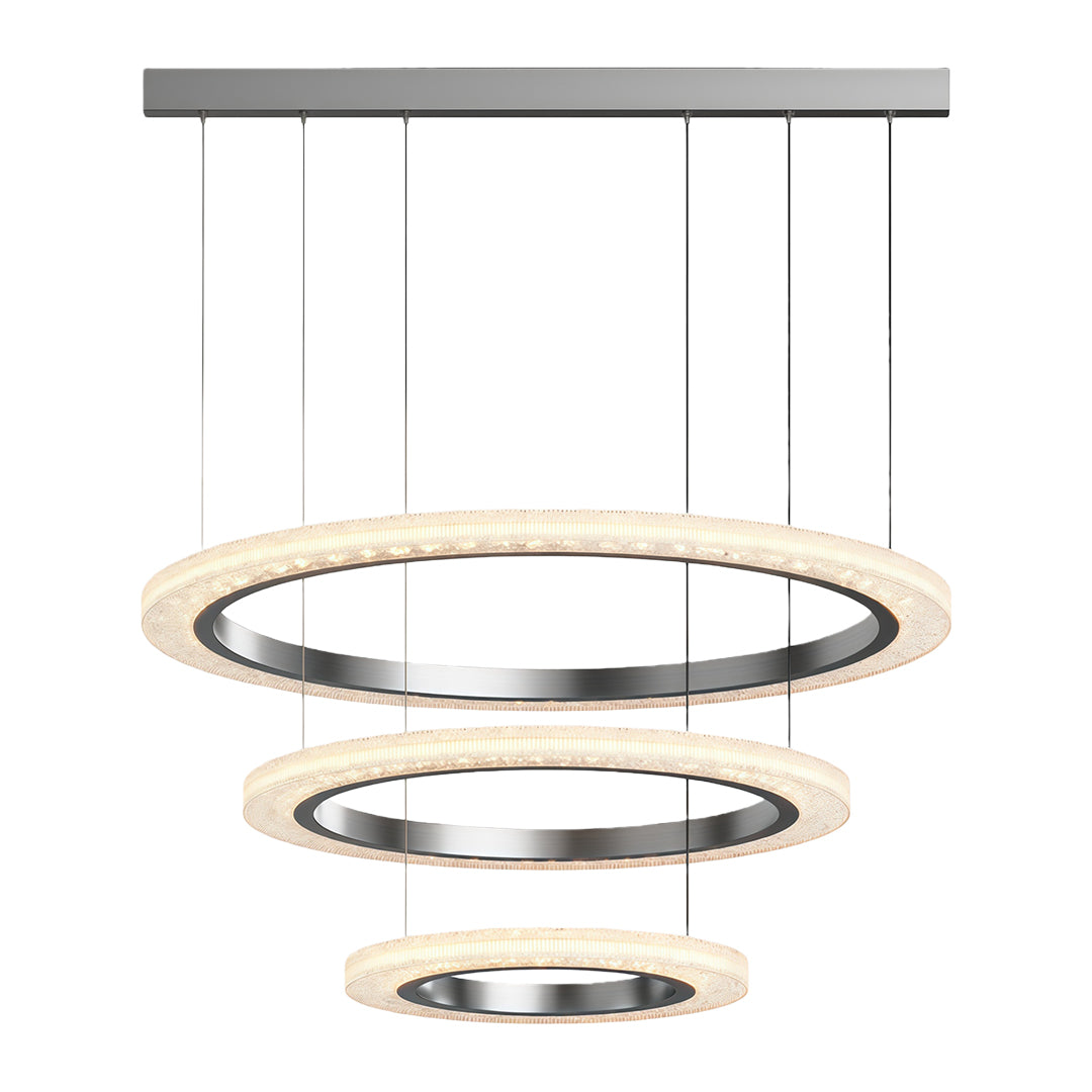 Round modern chandelier featuring triple chrome rings with cascading crystal bands