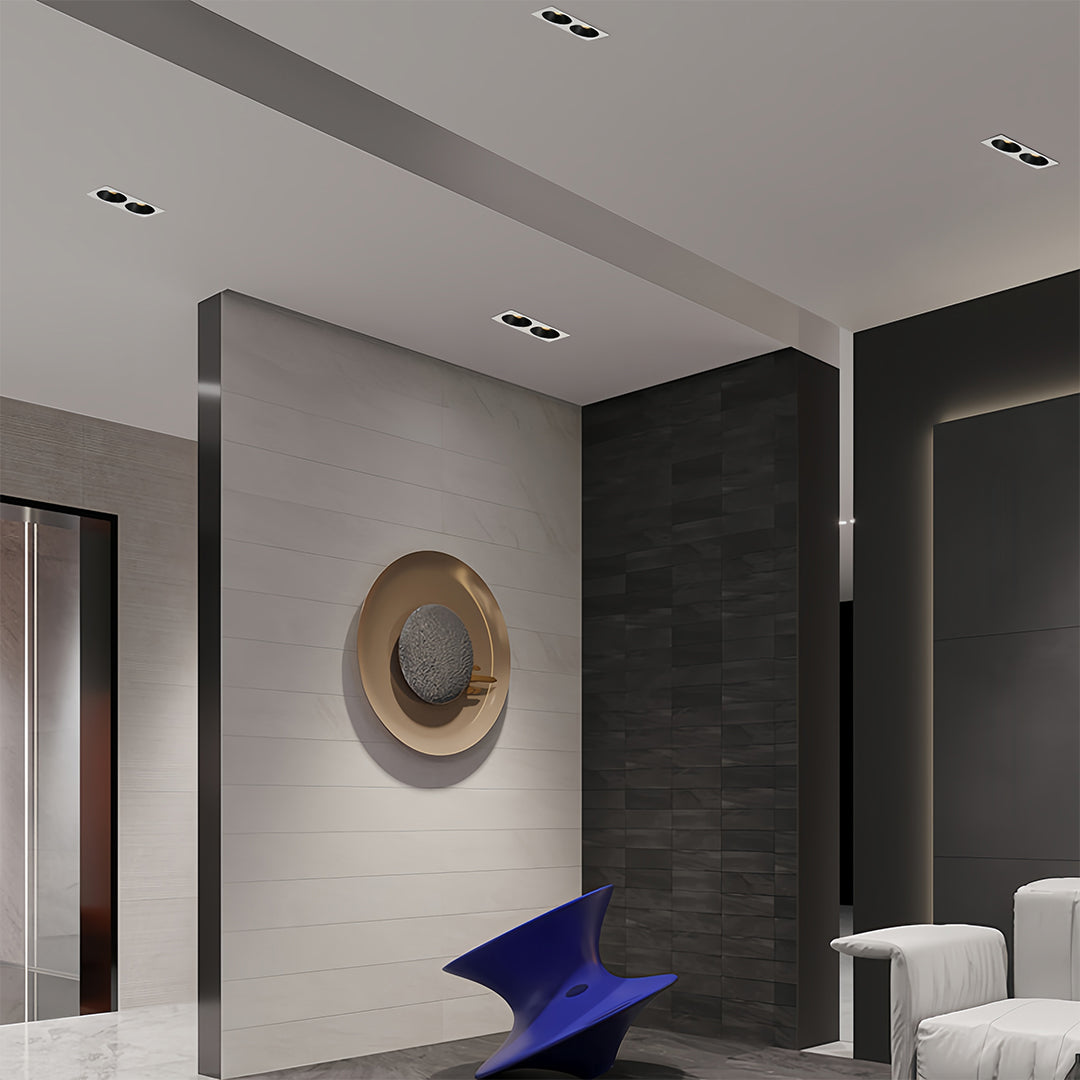 Triple square recessed downlight with black interior and white housing in a modern interior