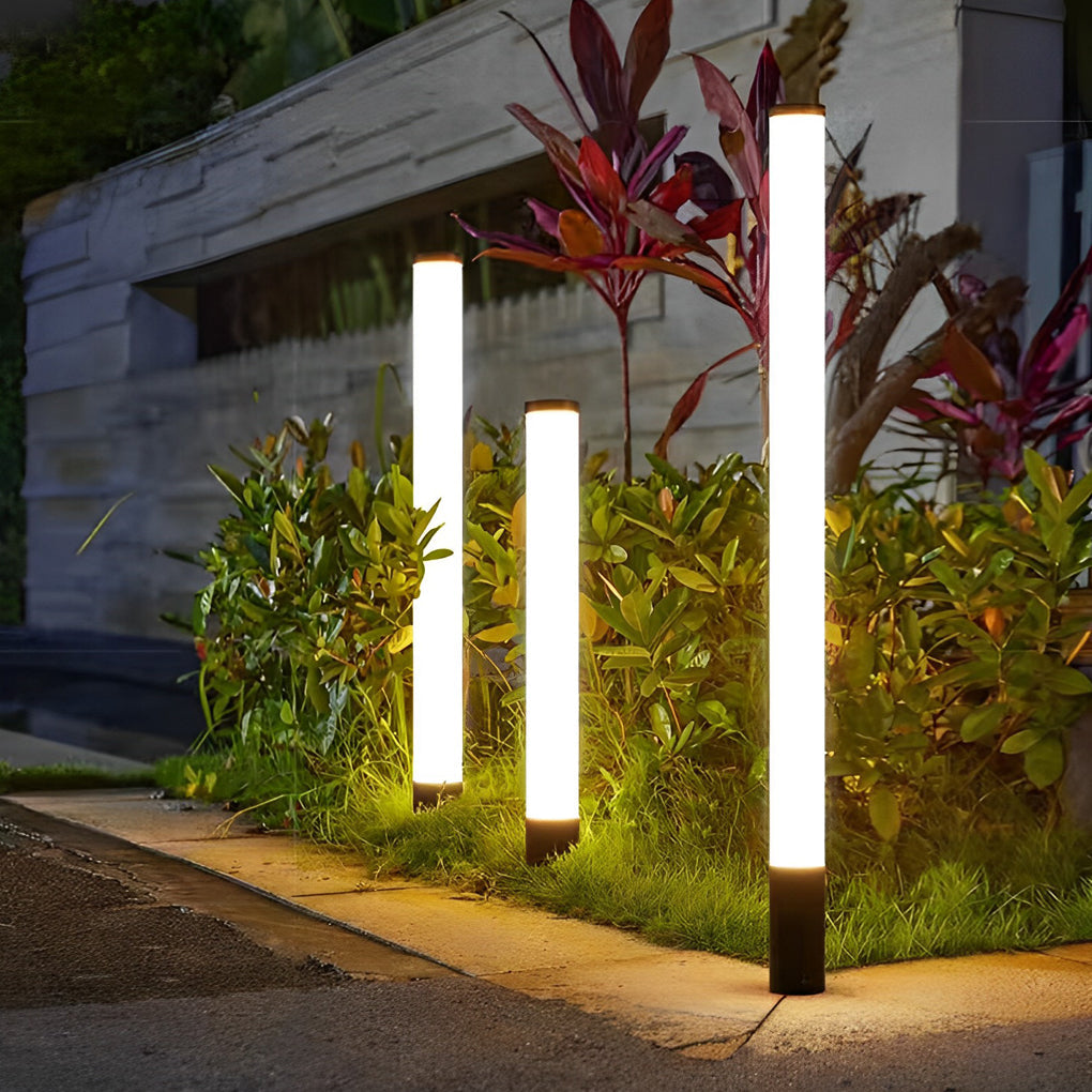 Tube landscape light in a group of three, adding a stylish touch to the garden landscape.