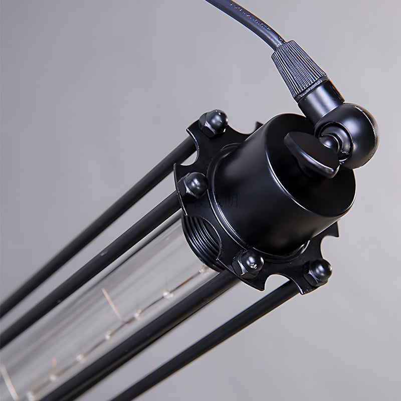 Single tube pendant light with a black finish, providing focused illumination.