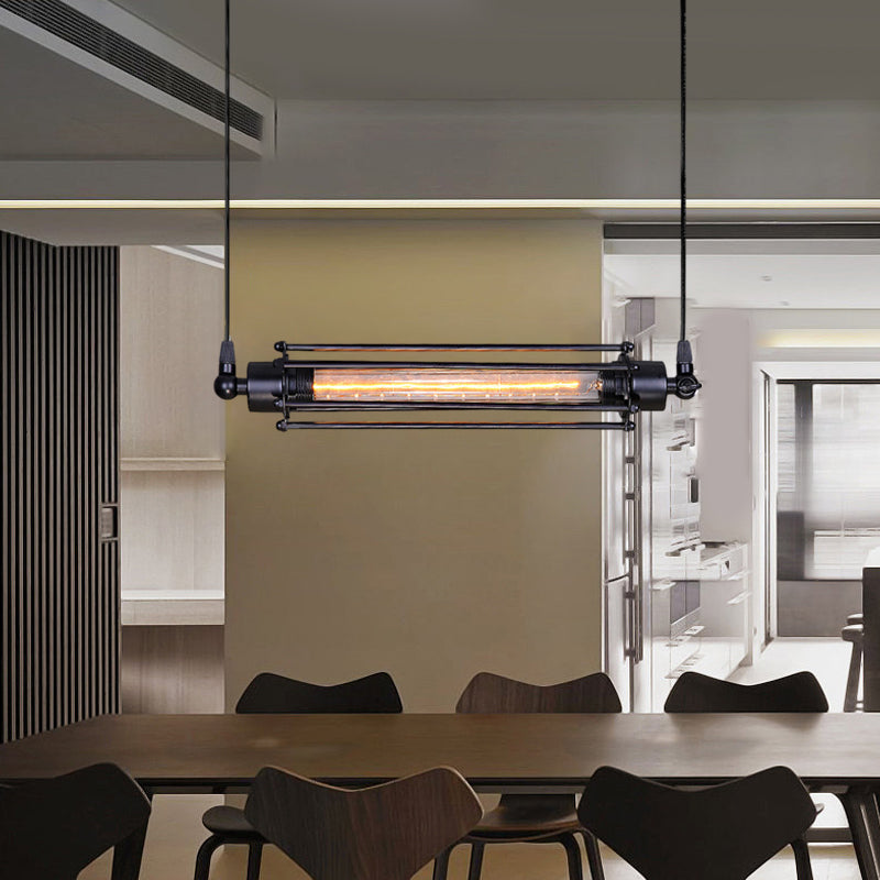Tube pendant light with a black frame illuminating a modern dining area.