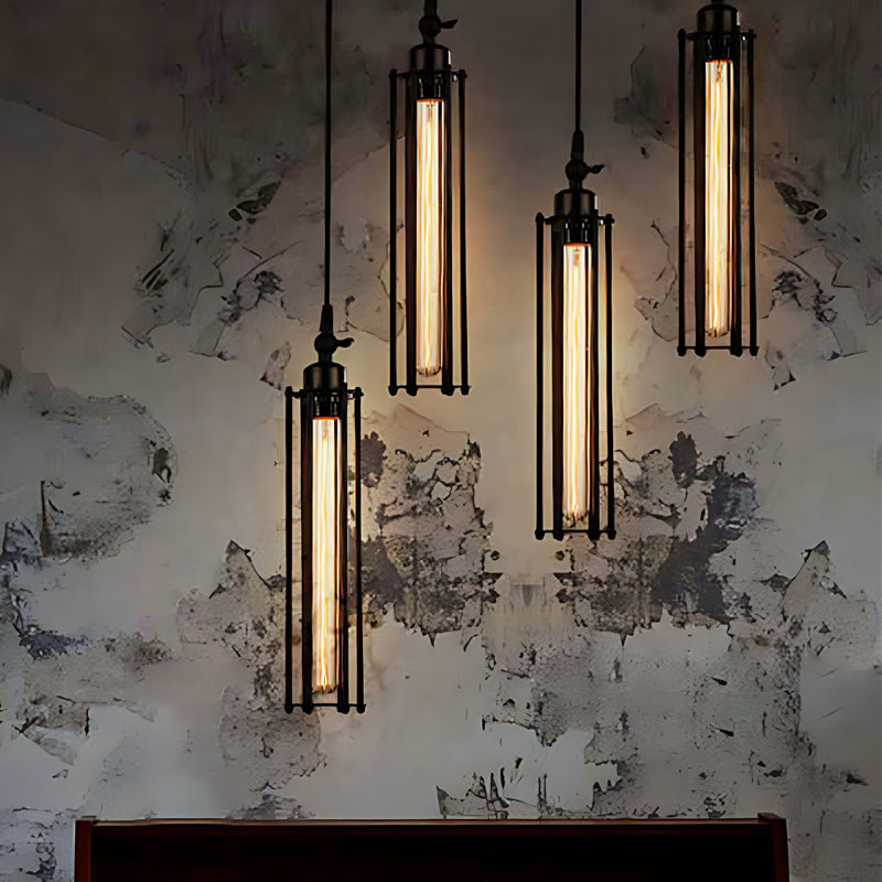 Three tube pendant lights mounted on a textured wall in a contemporary interior.