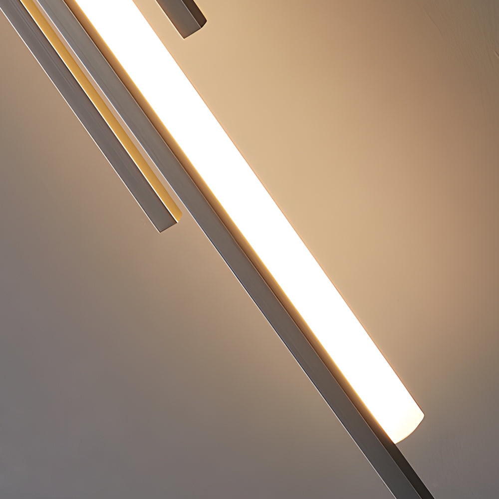 Close-up of linear tube wall sconce with warm LED strip.