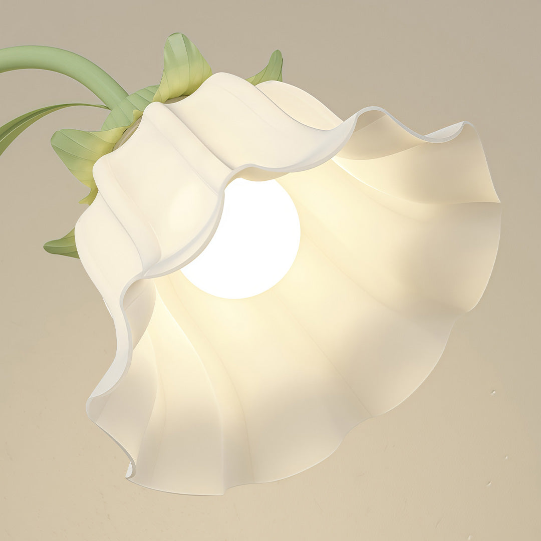 Tulip floor light with a gold finish, highlighting its luxurious and contemporary style.