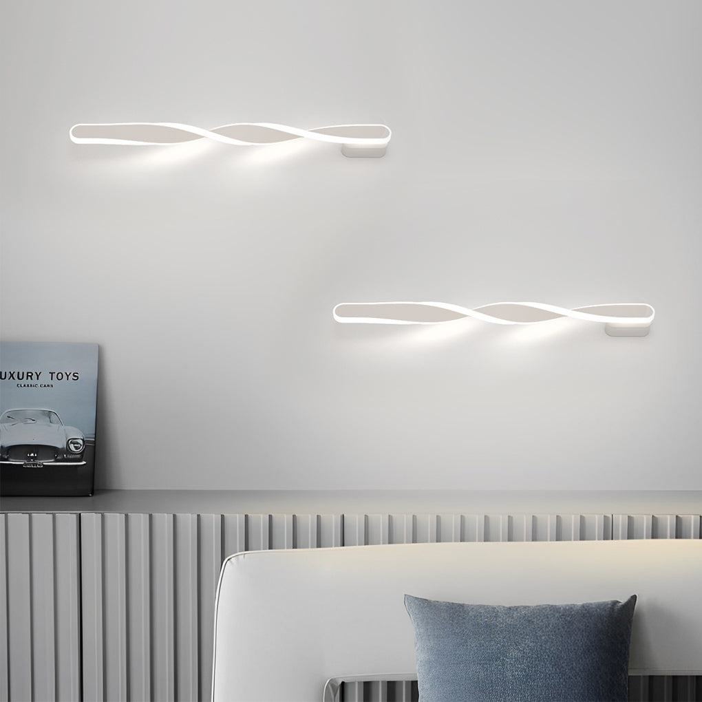 Twisted LED wall lights with a minimalist design, enhancing a stylish hallway.