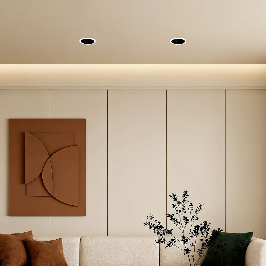 Two anti glare downlights illuminating serene modern living space with neutral tones and natural light