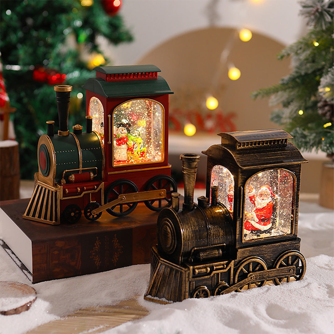 Two-piece Christmas train set with warm interior lighting and holiday decorations.