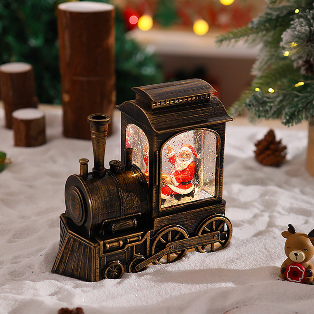 Two-piece Christmas train set with warm interior lighting and holiday decorations.
