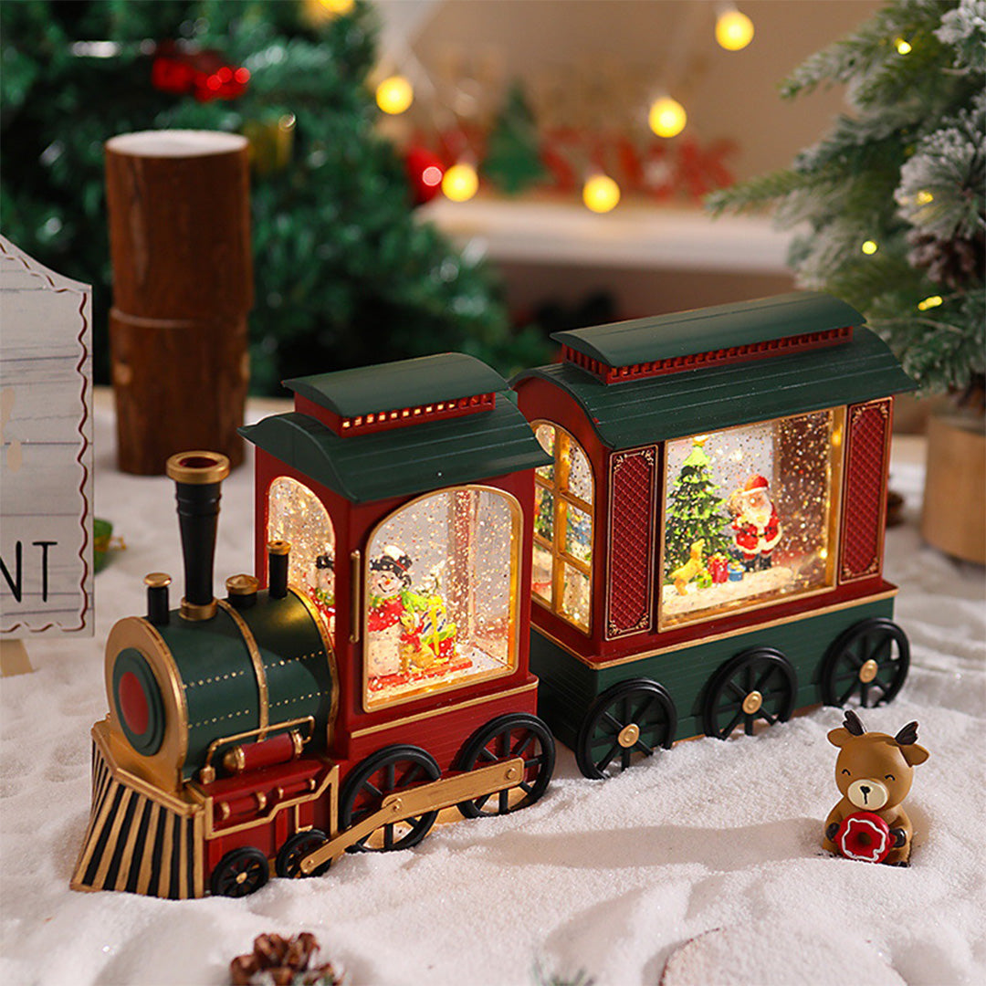 Two-piece Christmas train set with warm interior lighting and holiday decorations.