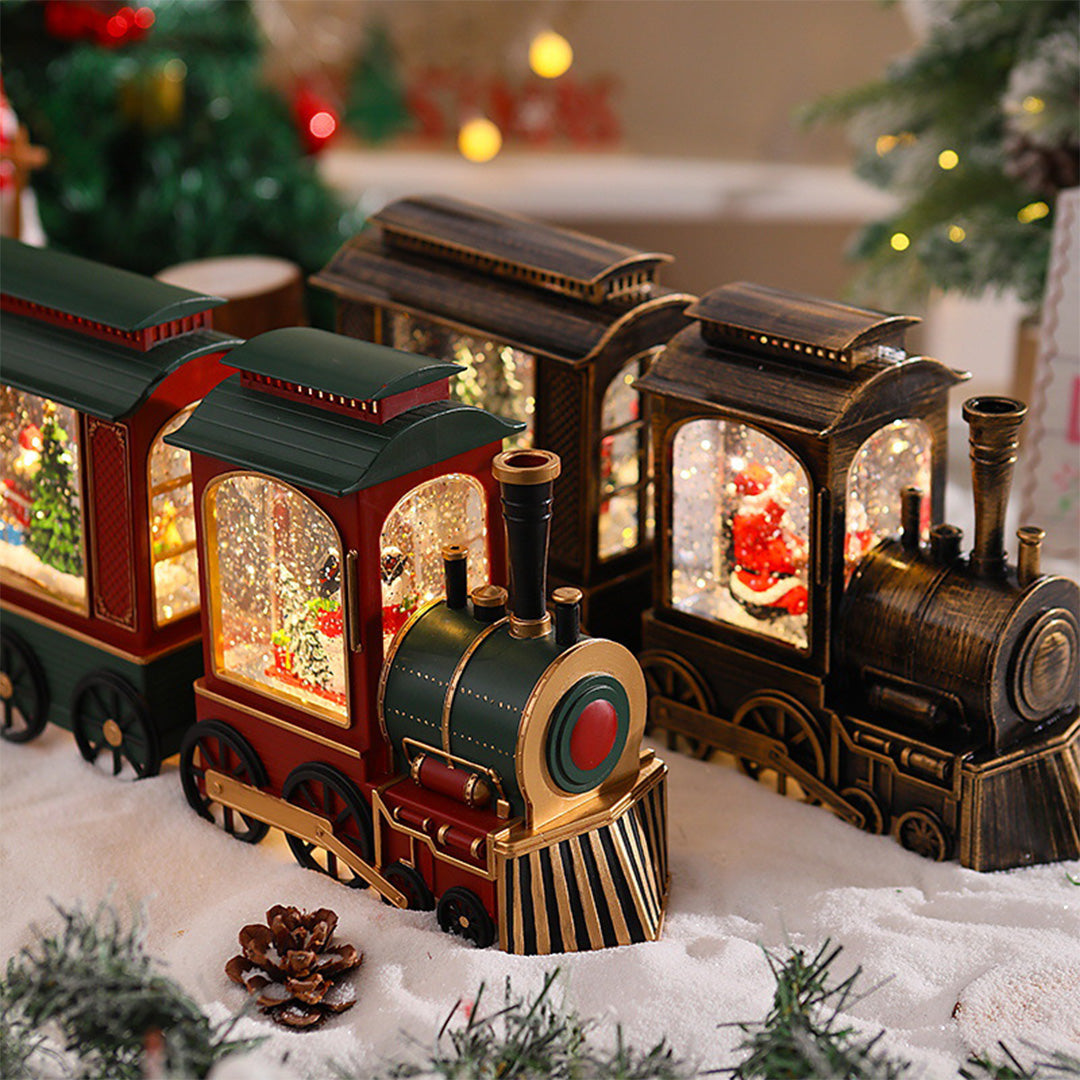Two-piece Christmas train set with warm interior lighting and holiday decorations.
