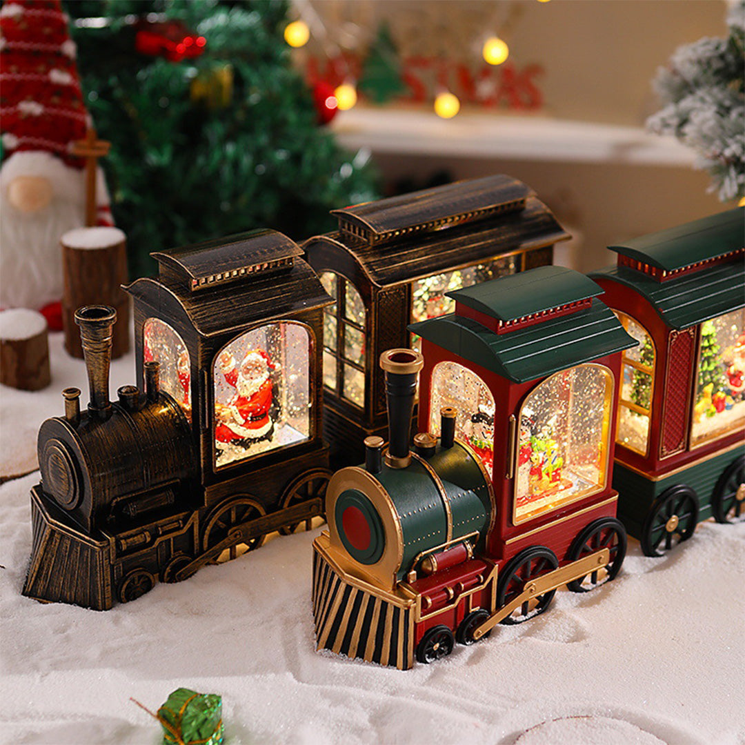 Two-piece Christmas train set with warm interior lighting and holiday decorations.