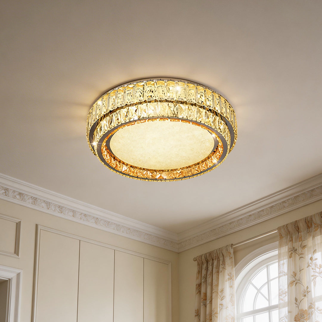 Unique contemporary flush mount lighting with a gold crystal ring and a glowing textured center.
