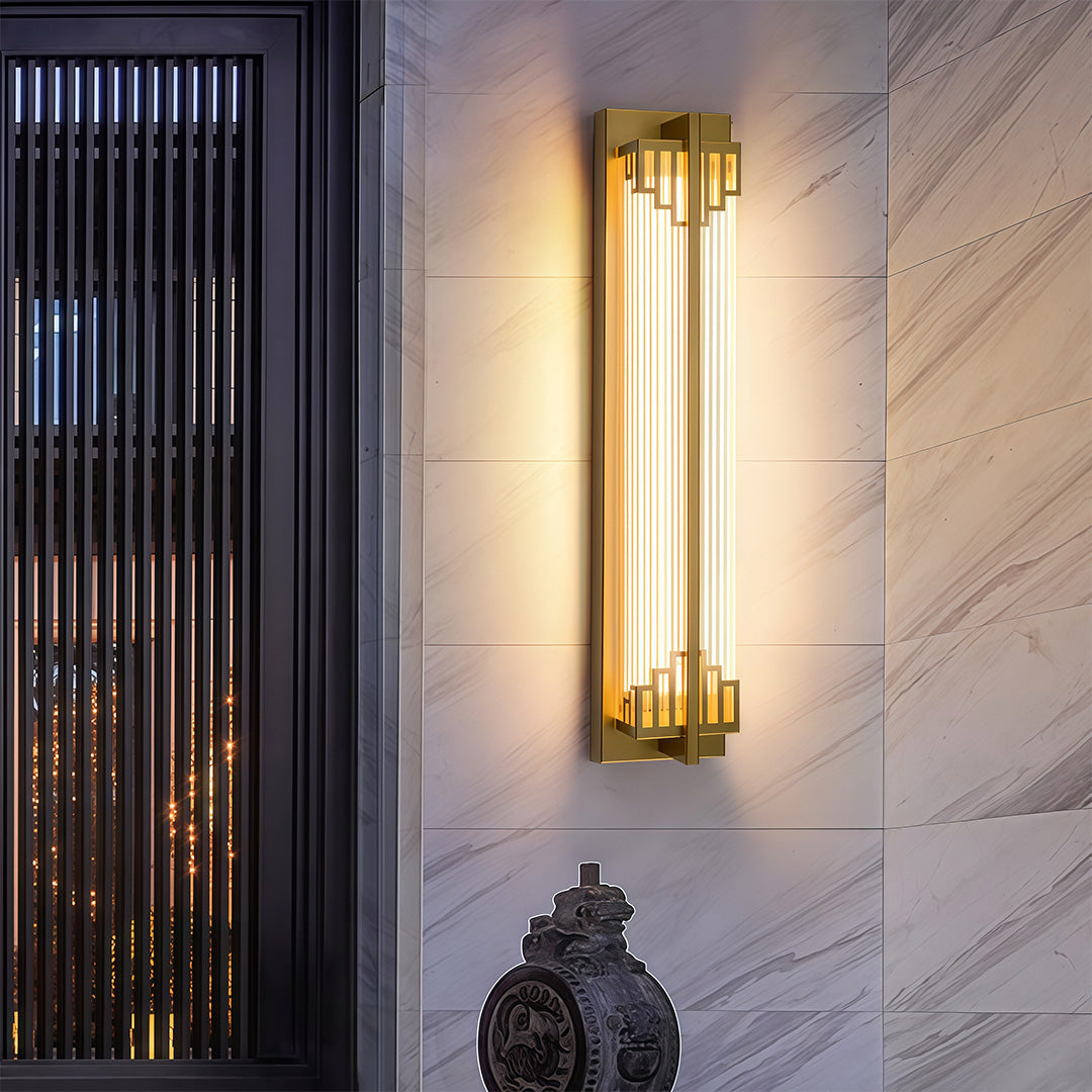 Outdoor wall mounted LED lights with a unique golden design, adding a modern touch to the outdoor space.