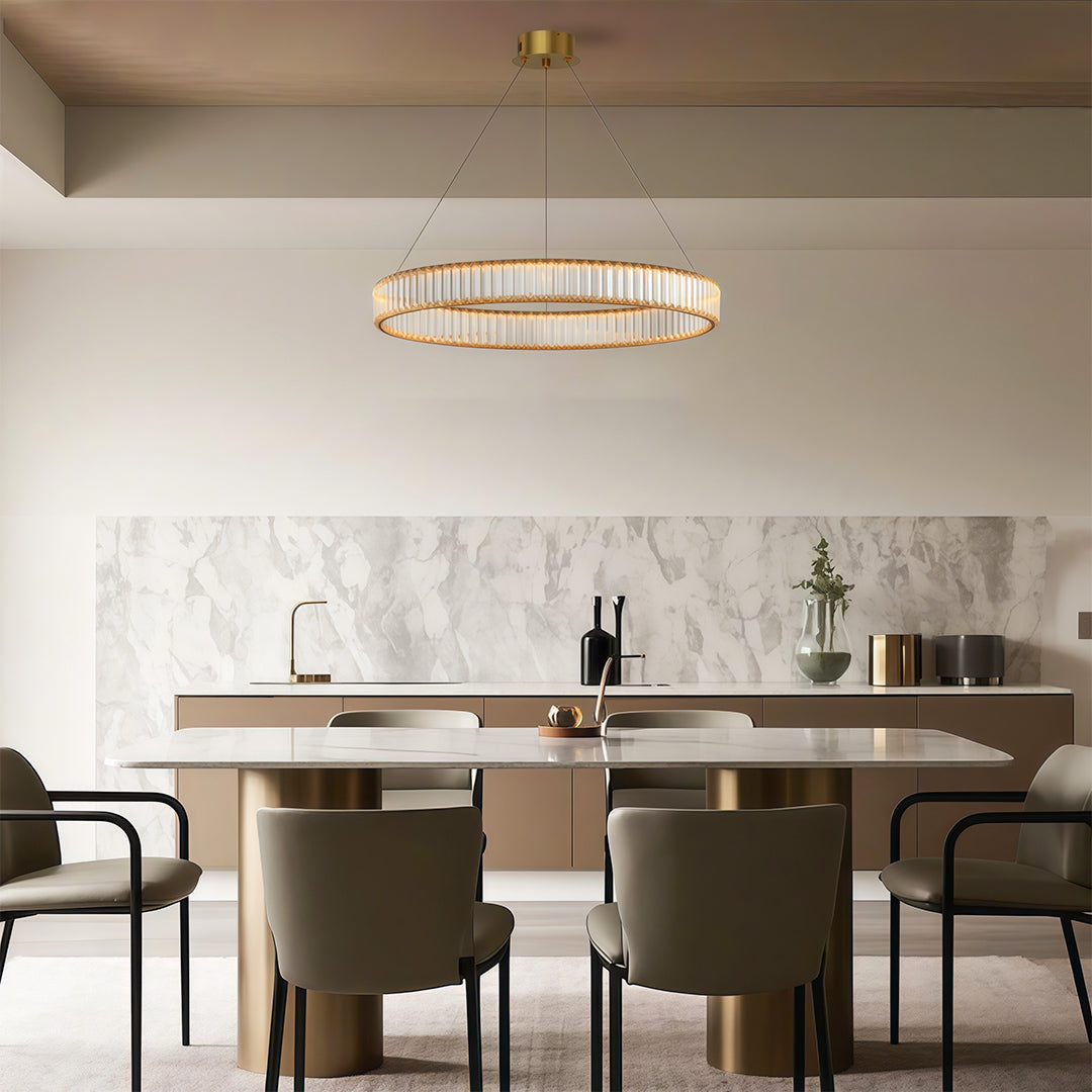 Unique modern chandeliers enhancing sophisticated dining area with marble and wood tones