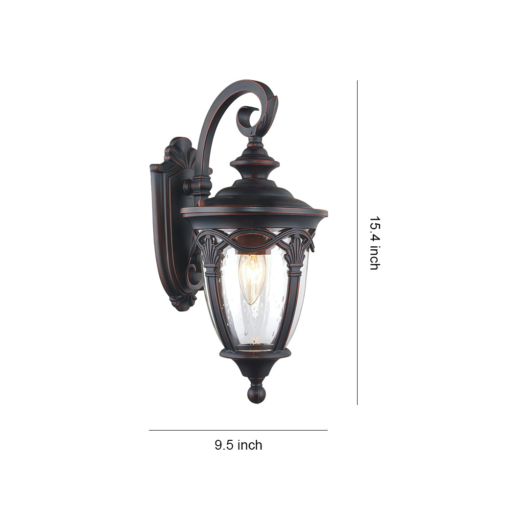 Unique outdoor sconce with ornate scrolled bracket and amber glass in bronze finish, displayed with dimensions