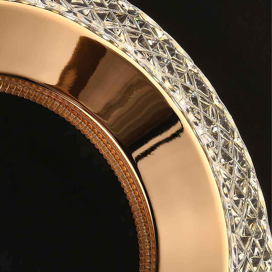 Close-up of crystal edge detail on a unique gold pendant light.