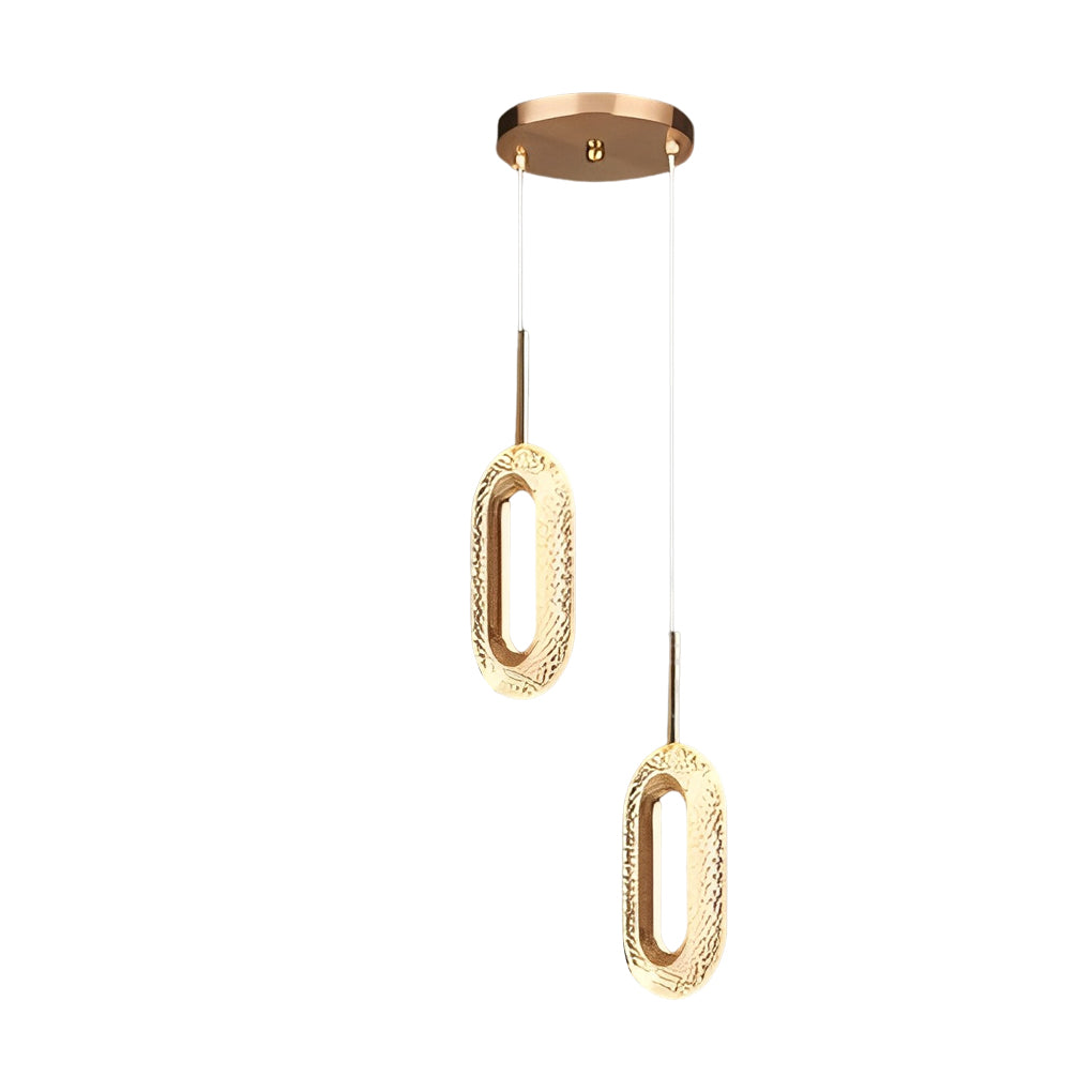 Macro view of gold metal and crystal texture on a unique pendant light.