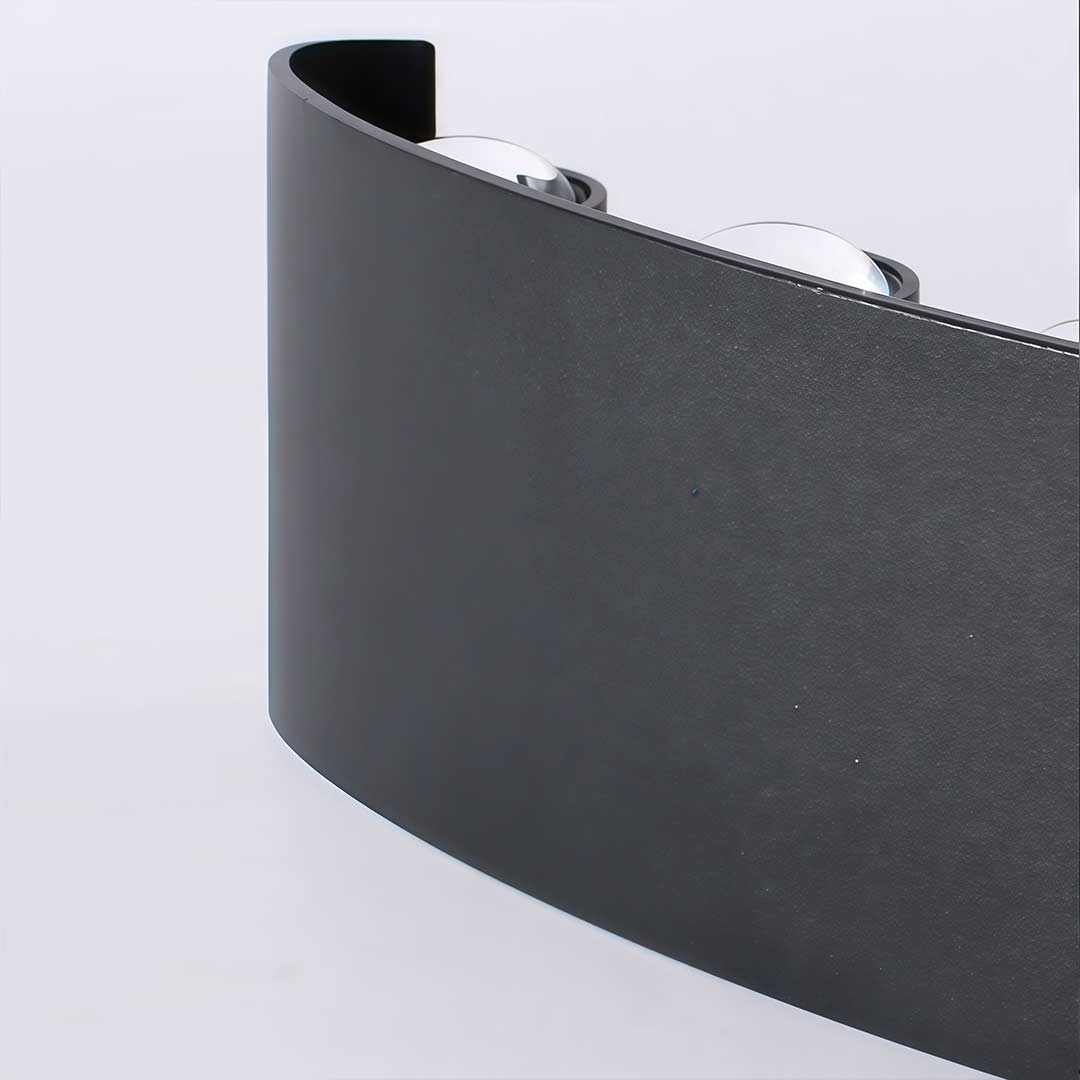 Up and down light wall sconce with close-up of the adjustable mechanism.