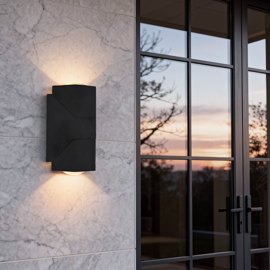 Close-up of up down sconce outdoor with motion sensor and sleek black finish for modern security lighting.