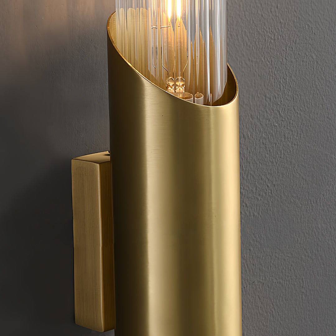 Up down wall lights with cylindrical glass shades, providing balanced lighting for modern interiors.