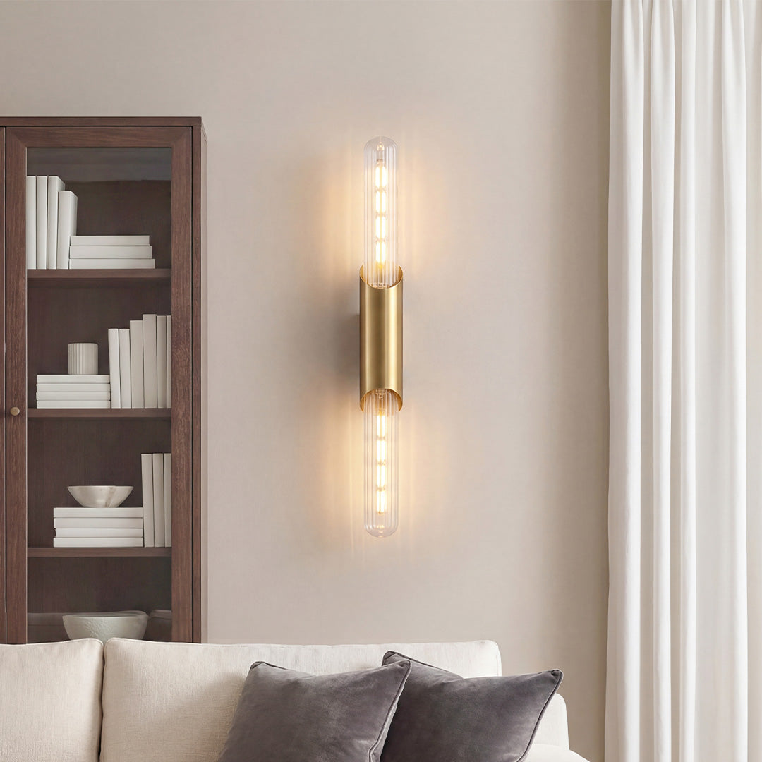 Up down wall lights gold LED with fluted glass shade provides elegant, ambient illumination for indoor and outdoor spaces.