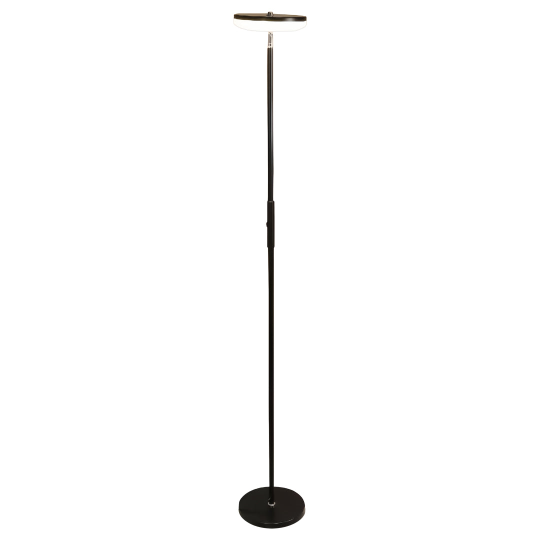 Uplight floor lamp creating dramatic ceiling lighting in stylish living room with warm interior tones