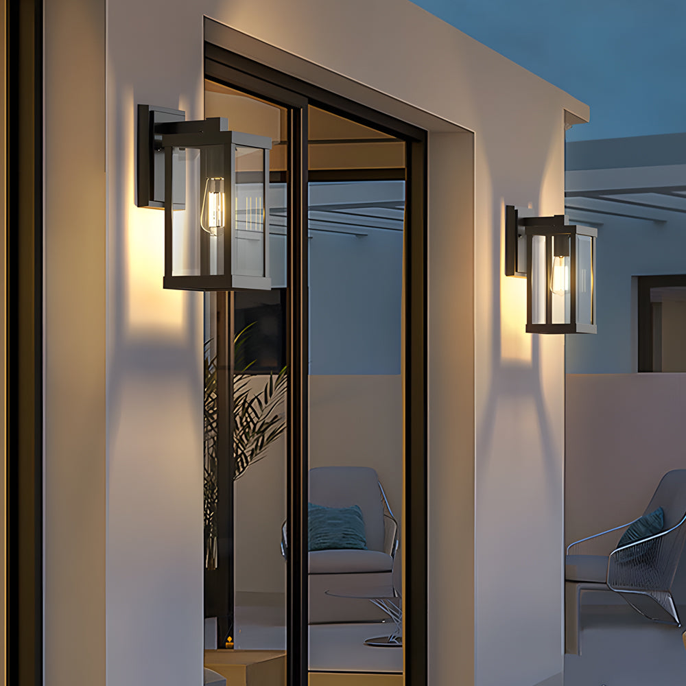 Upscale entryway featuring coordinated outdoor lantern fixtures creating welcoming illumination at entrance