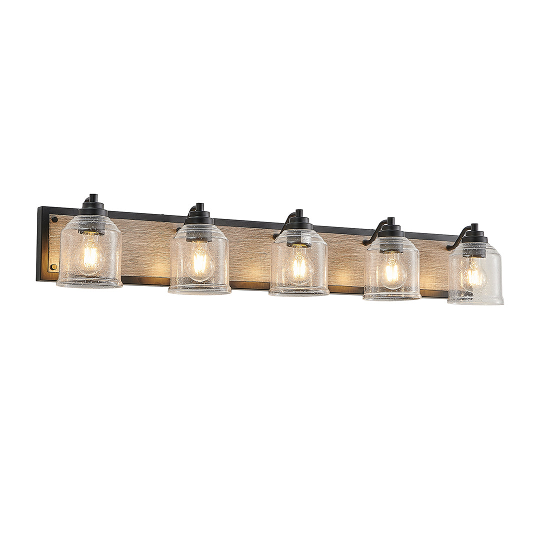 Multi-light wall sconce illuminating a vanity area, providing even and stylish lighting for daily routines.