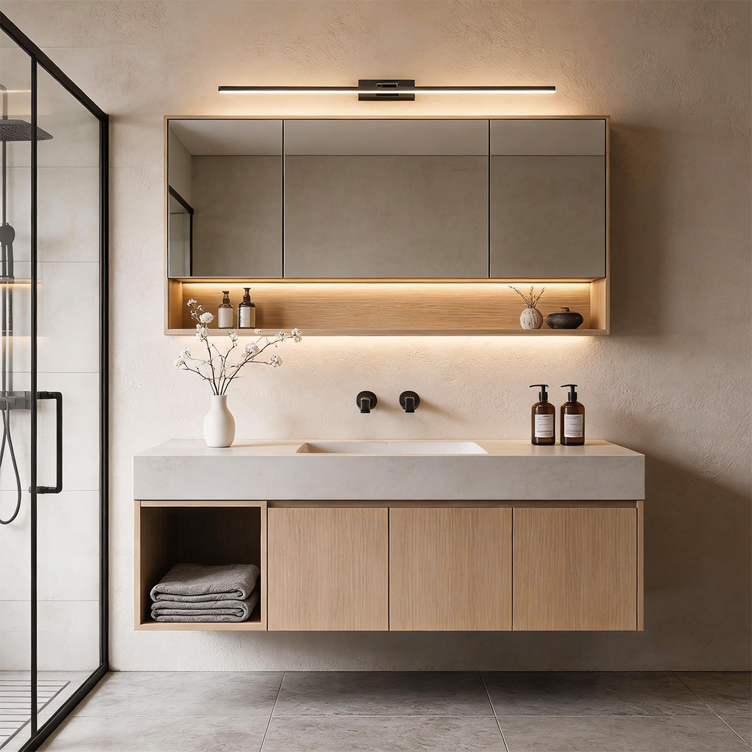 Contemporary bathroom vanity with integrated cabinetry and linear vanity LED lights for mirror providing balanced illumination across the mirror surface.
