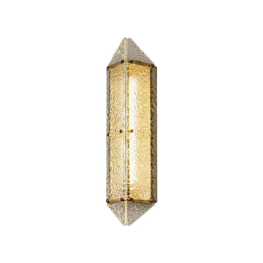 Vertical outdoor wall sconce with gold metal accents and textured glass shade