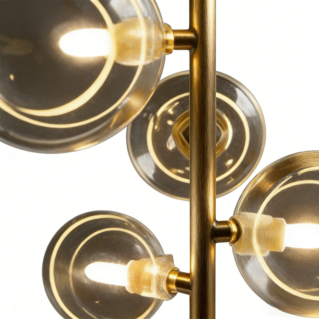 Vertical ring pendant light with a modern design, illuminating a stylish bedroom interior.