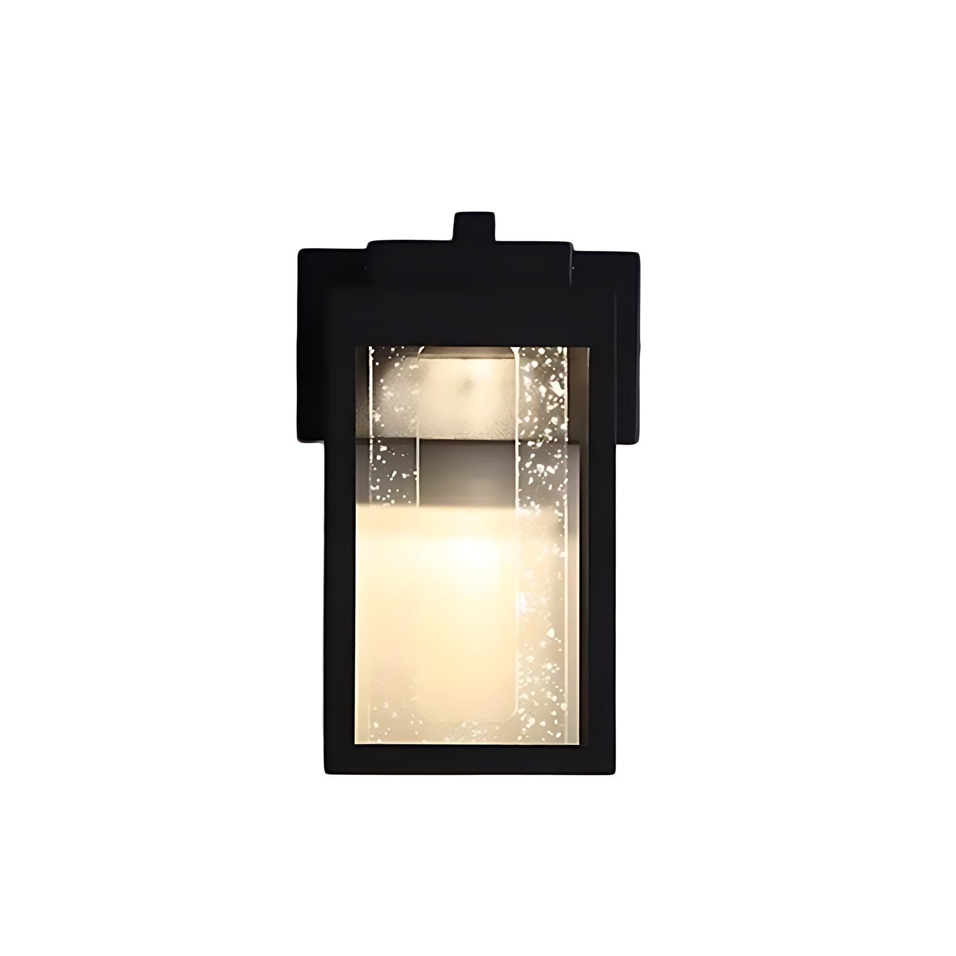 Extended vertical outdoor light with textured glass creating dramatic architectural accent
