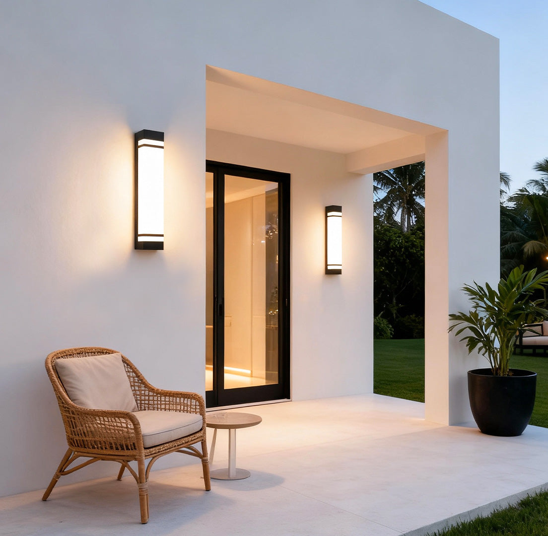 Vertical wall lighting enhancing the outdoor seating area with a cozy and inviting glow.