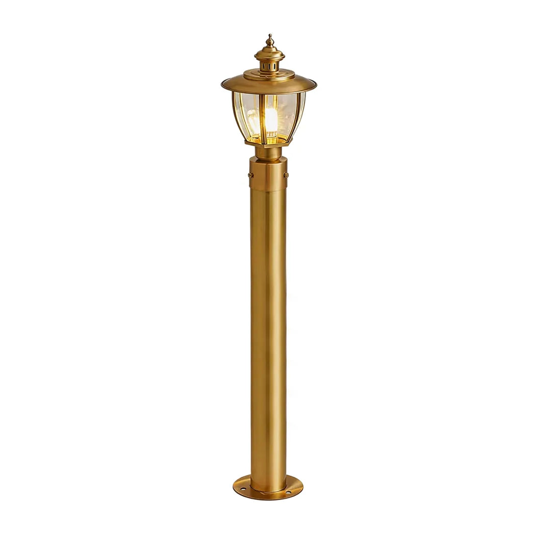 Vintage brass outdoor pathway light with classic lantern head and decorative post