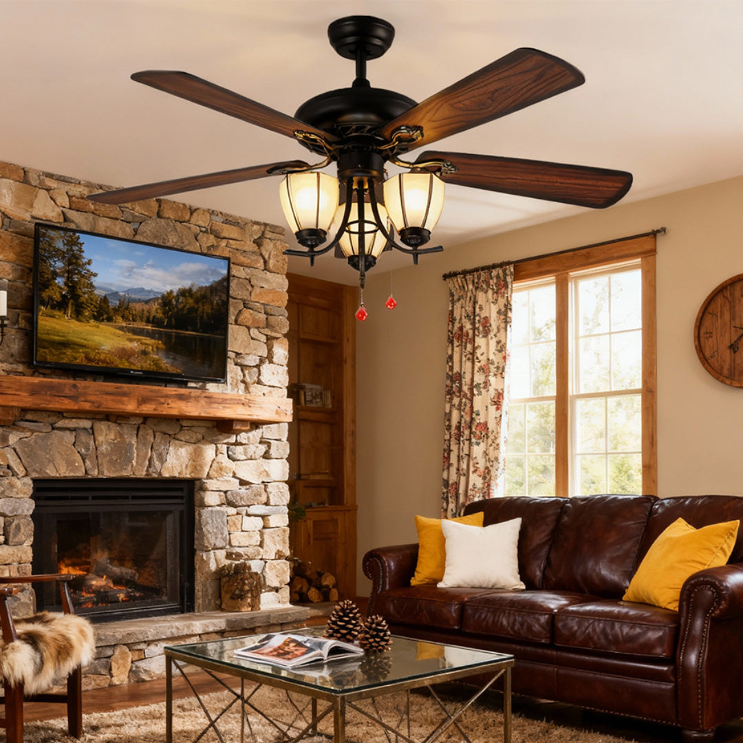 Vintage style ceiling fan with lights enhancing cozy living space with exposed brick, fireplace, and traditional decor.