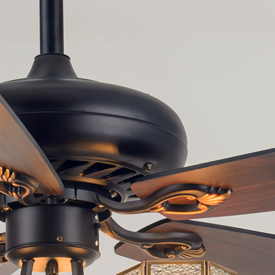 Vintage style ceiling fan with lights showing retractable blade design in motion with chandelier-style lighting.