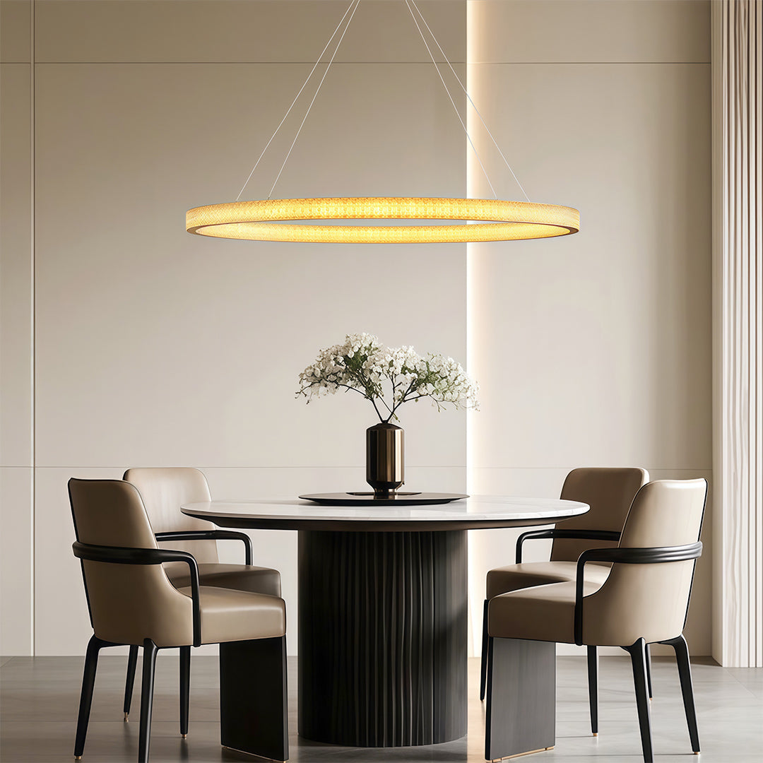 Modern luxury chandeliers creating warm ambiance in elegant dining room with built-in shelving