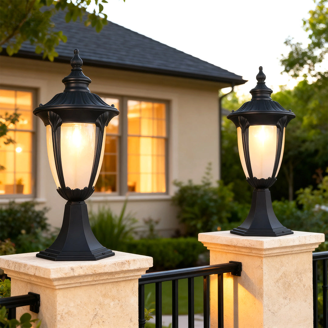 Vintage-style exterior pillar light illuminating a driveway, warm and inviting outdoor lighting